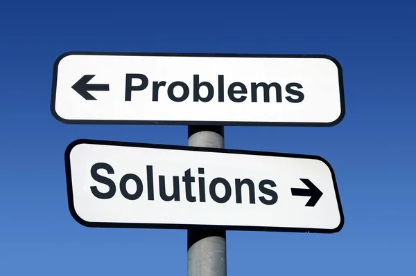 Panneau indiquant les problèmes et les solutions . Photo De Stock