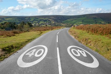 40 mph signs on a country road. clipart