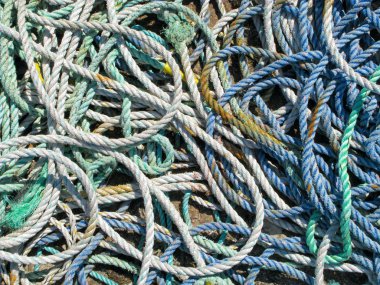 Close up of lots of fishing boat ropes. clipart