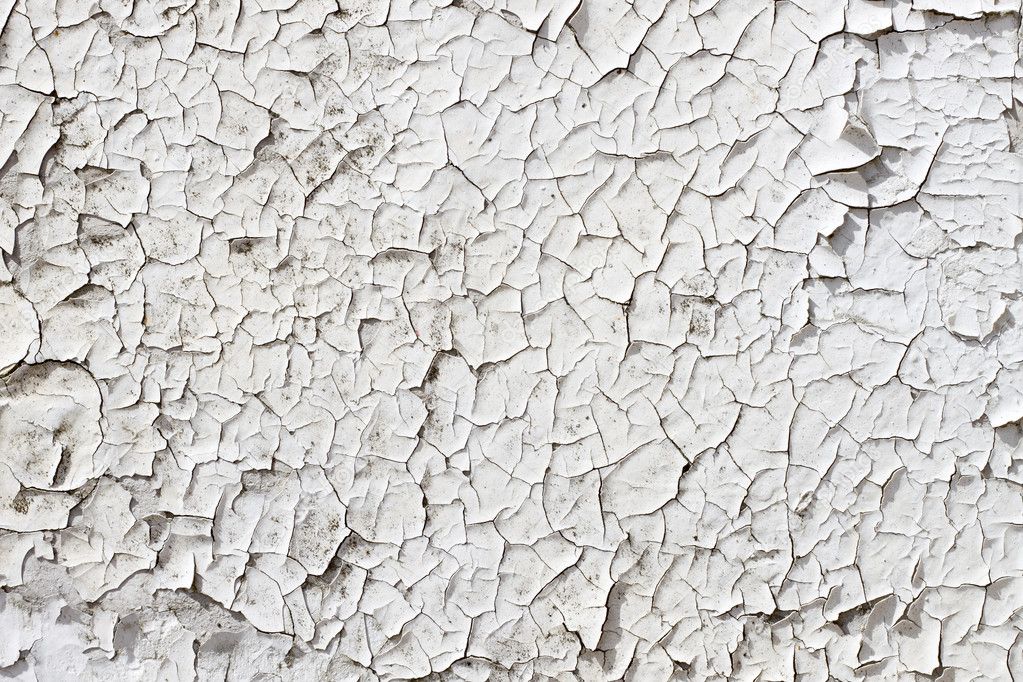 Close up of old cracked white paint.