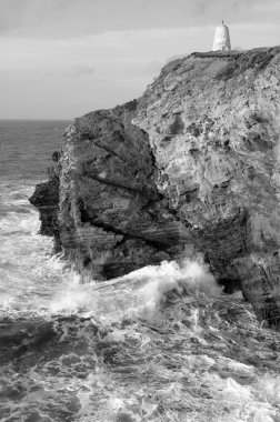 Cliffs in Portreath Cornwall UK. clipart