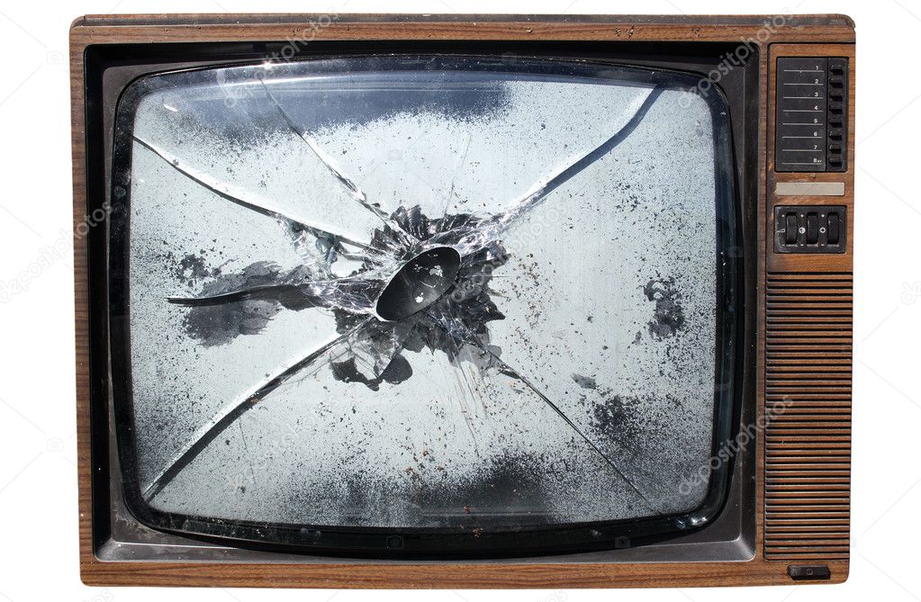 Old TV with a smashed screen.