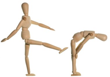 A mannequin giving a motivational kick. clipart