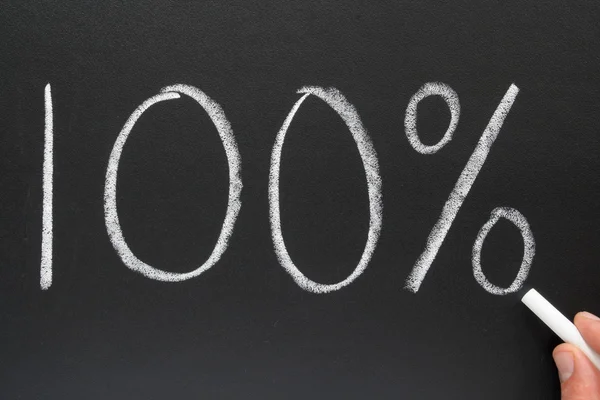 Writing 100% on a blackboard. — Stock Photo, Image