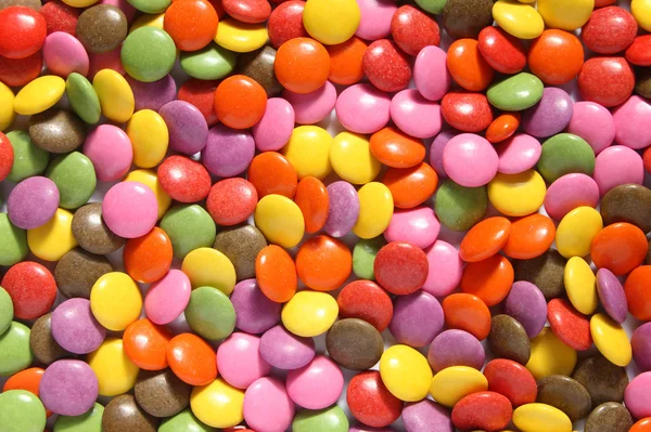 stock image Lots of colorful smarties.
