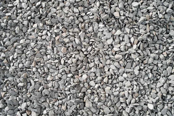 Viele große graue Steinsplitter. — Stockfoto