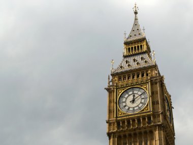 Big Ben and a gloomy grey sky. clipart