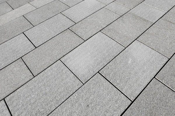 Large grey paving slabs close up. — Stock Photo, Image