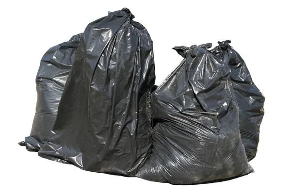 Черные британские мусорные мешки, изолированные . — стоковое фото