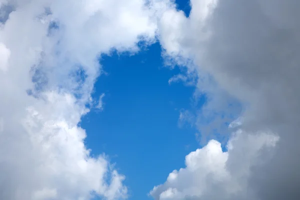 stock image Rround patch of blue sky.