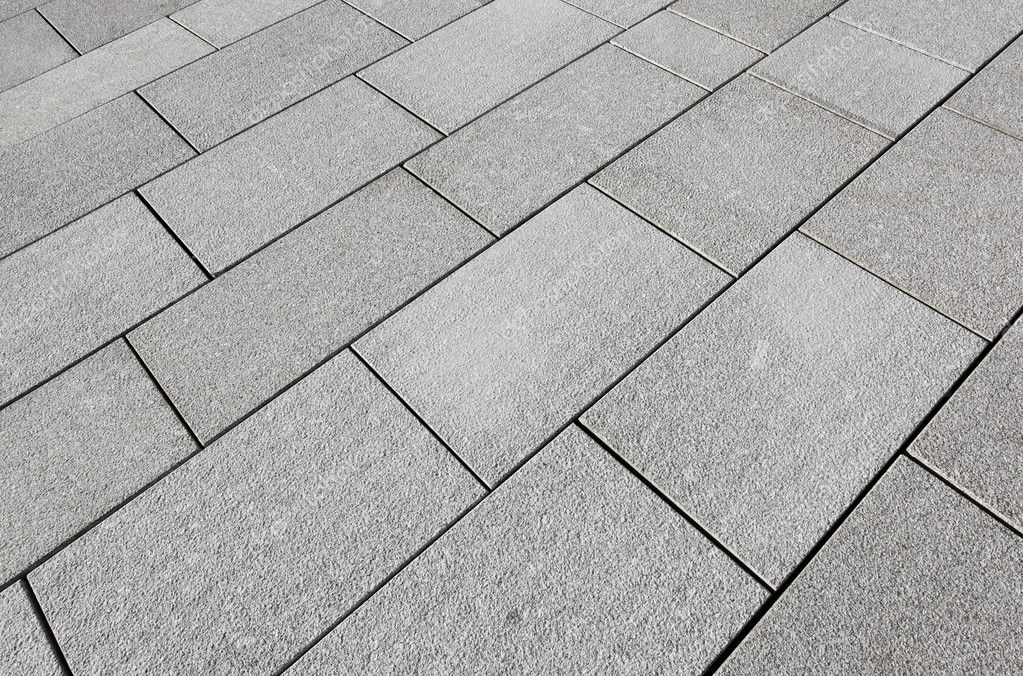 Large grey paving slabs close up. — Stock Photo © SRphotos #2612492