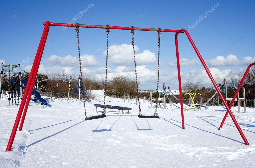 Child's swings snow.