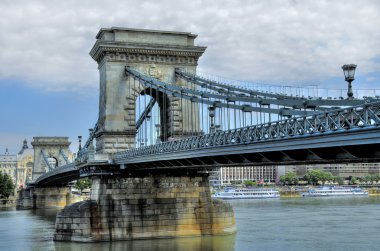 Chain brige in the blue morning motif. clipart