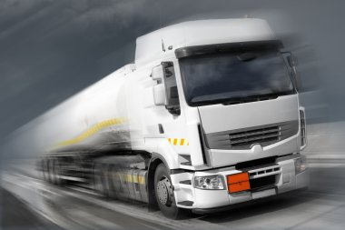 Truck with fuel tank in motion clipart