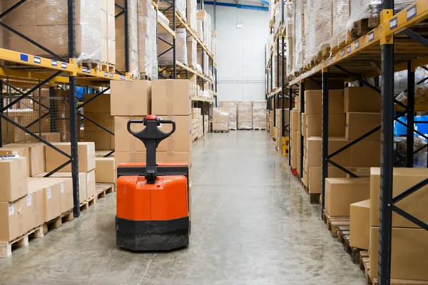 Industrial warehouse and forklift — Stock Photo, Image