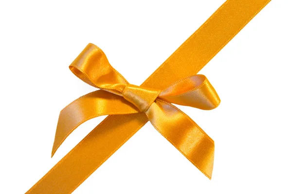 Golden diagonal ribbone with bow — Stock Photo, Image