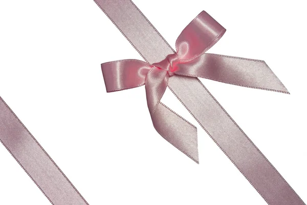 Pink diagonal ribbon with bow — Stock Photo, Image