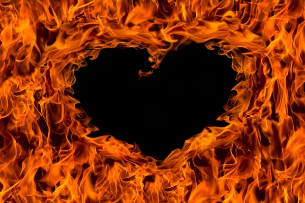 Oheň plamen pozadí tvaru srdce — Stock fotografie