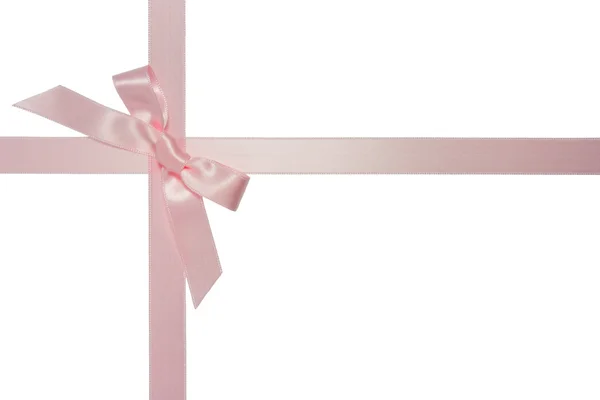 Fita rosa cruz com arco isolado — Fotografia de Stock