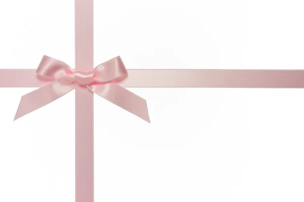 Pink cross ribbon with bow isolated — Stock Photo, Image