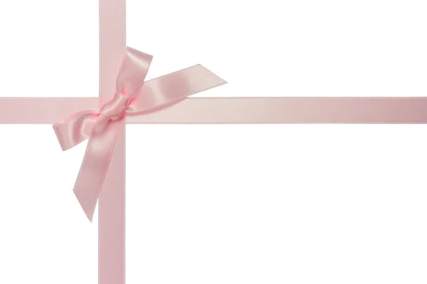 Рожевий хрест стрічки з бантом ізольовані — стокове фото