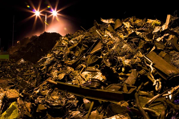 Heap of rusty metal scrap and lights — Stock Photo, Image