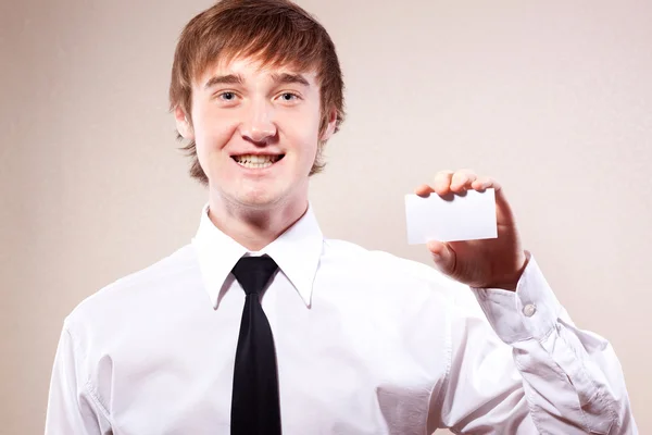 Man holding a blank business card — Stock Photo, Image