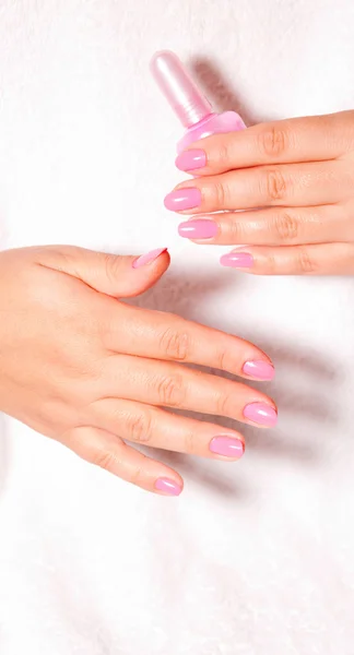 Beautiful woman hands with manicure on w — Stock Photo, Image
