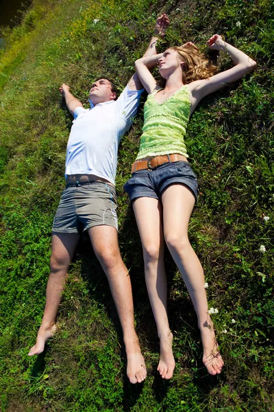 Couple on grass — Stock Photo, Image