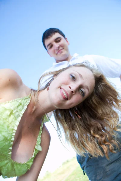 Couple fooling around outdoors — Stock Photo, Image
