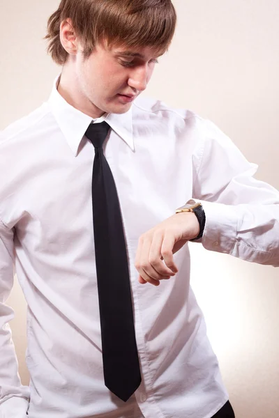 The young man looked at his watch — Stock Photo, Image
