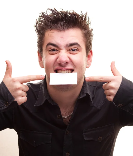 A young man holding a blank card — Stock Photo, Image