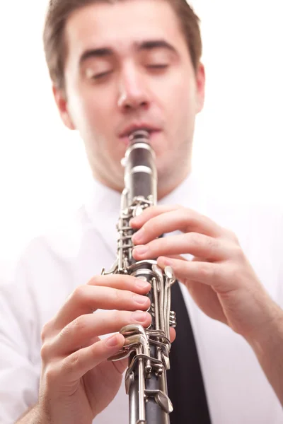 Людина грати на кларнет — стокове фото