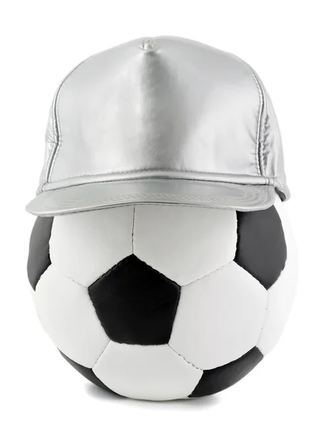 Soccer ball and cap — Stock fotografie