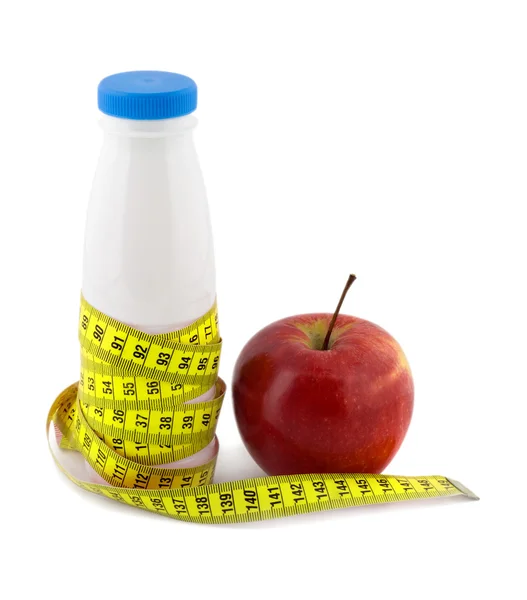 Láhev mléka apple opatření páska — Stock fotografie