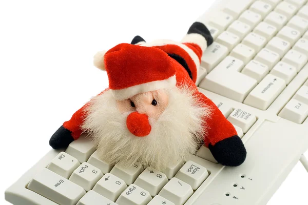 Papai Noel no teclado — Fotografia de Stock