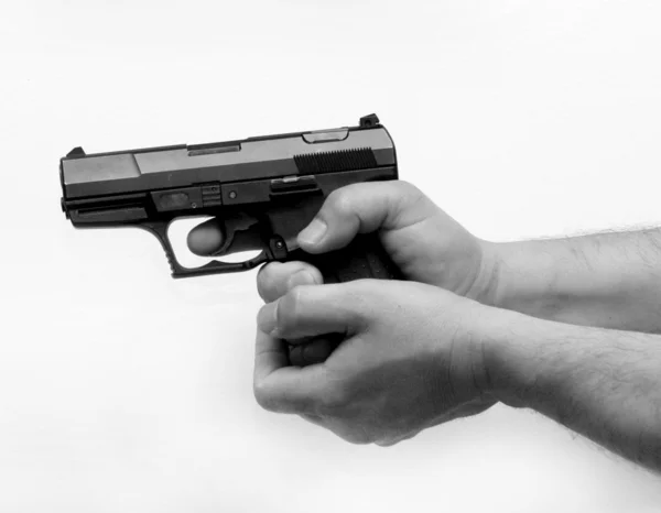 Pistola en mano —  Fotos de Stock