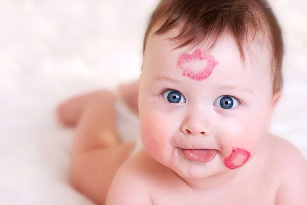 Bambino con baci — Foto Stock