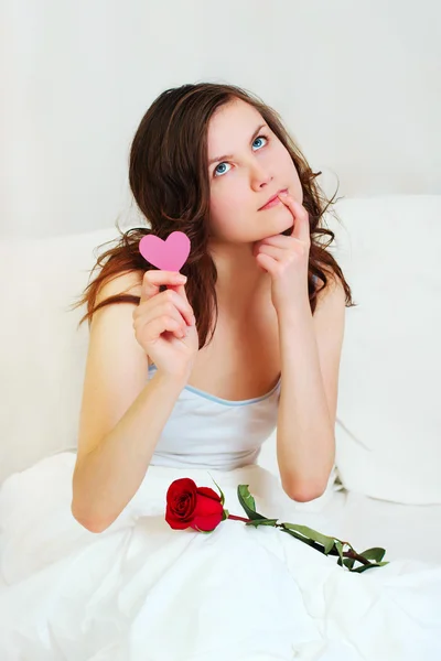 Girl in bed with valentine — Stock Photo, Image
