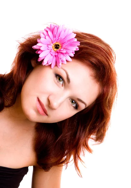 Menina com flor no cabelo — Fotografia de Stock