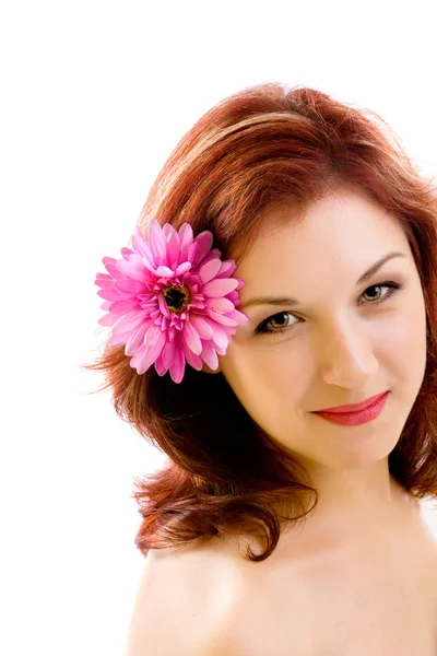 Girl with flower in hair — Stock Photo, Image