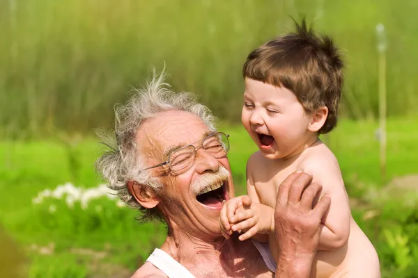 Nagyapa és unokája Stock Kép