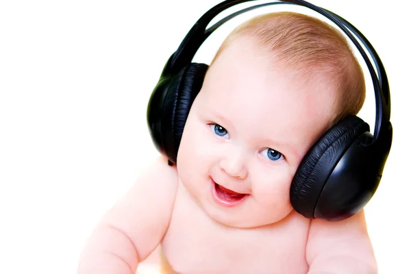 Baby i hörlurar — Stockfoto