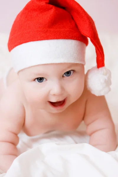 Baby in christmas hat Royalty Free Stock Photos