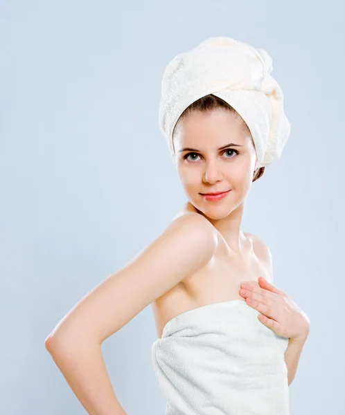 Woman with towel on the head Royalty Free Stock Images