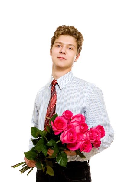 Νεαρός άνδρας με τριαντάφυλλα — Φωτογραφία Αρχείου