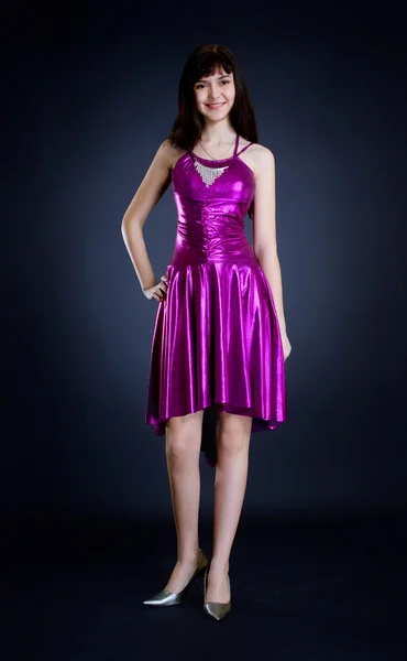 Beauty in purple dress — Stock Photo, Image