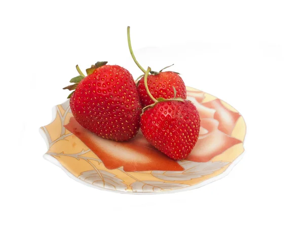 Strawberrys on ceramic saucer on white b — Stock Photo, Image