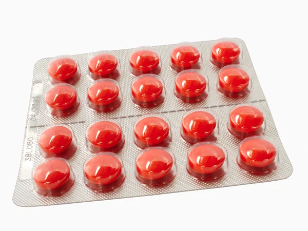 Encaje de píldoras aisladas en blanco backgr —  Fotos de Stock