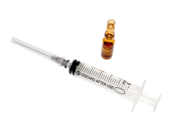 Syringe and drug ampula. — Stock Photo, Image